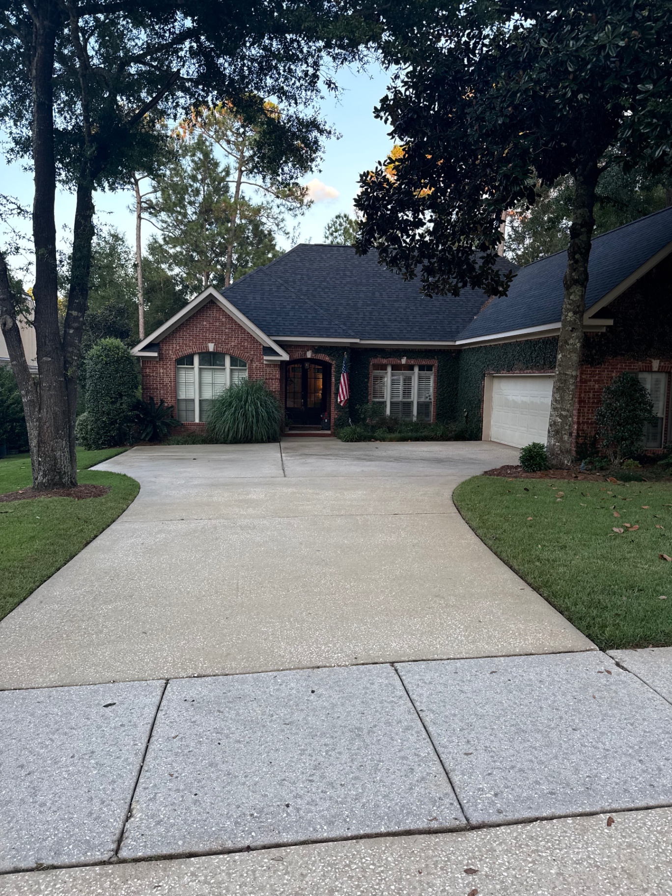 Freshly cleaned brick home and driveway in Auburn, Alabama